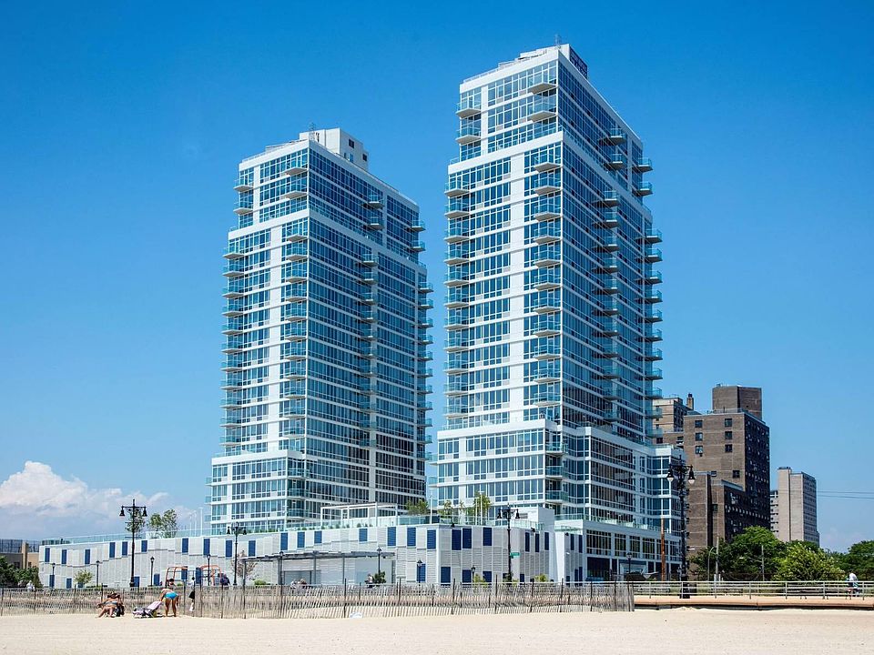 Ocean Drive towers beside Coney Island Beach